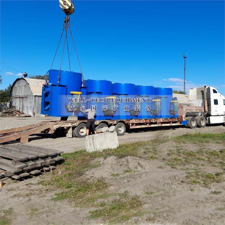 Auto discharge centrifugal concentrator